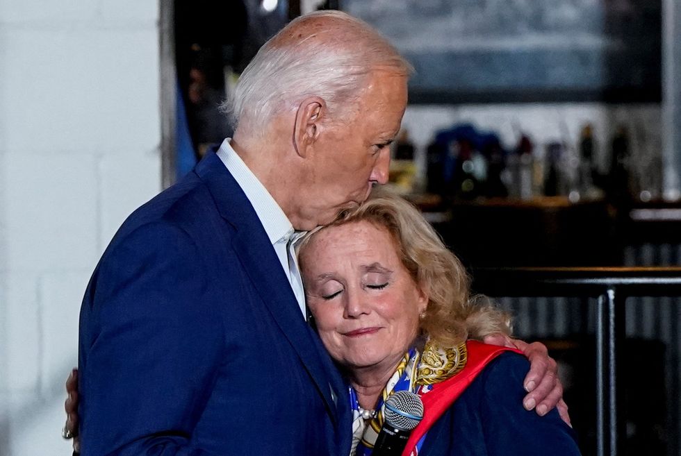 Joe Biden kisses Rep. Debbie Dingell