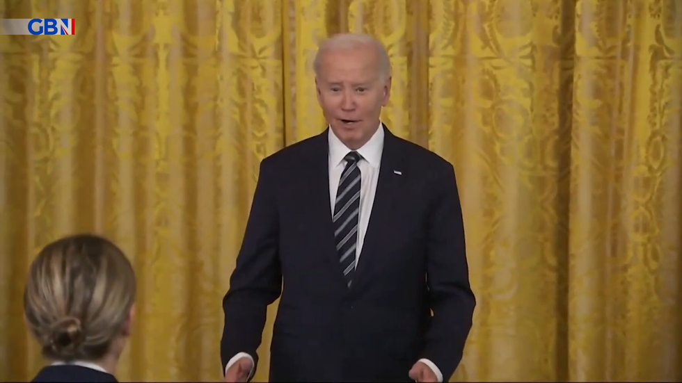 Joe Biden looks confused at White House awards ceremony