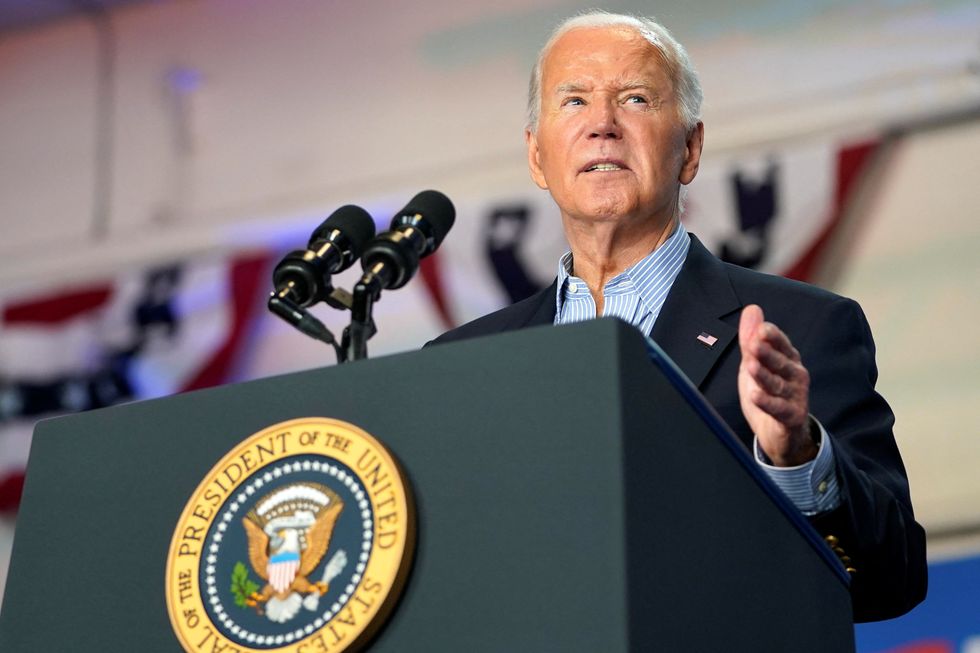 Joe Biden speaks during a campaign event at Sherman Middle School, in Madison, Wisconsin