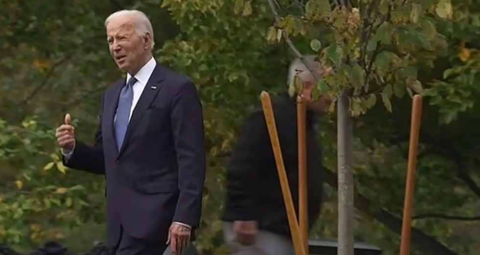 Joe Biden speaks to security.