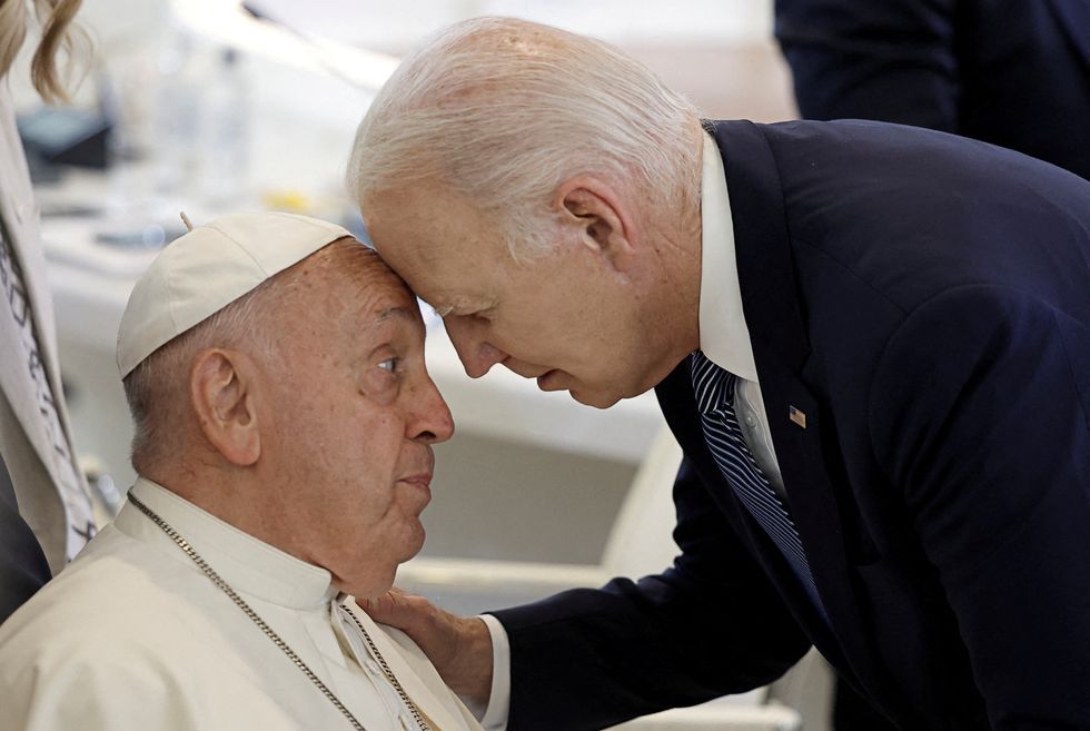 Joe Biden touches foreheads with Pope Francis