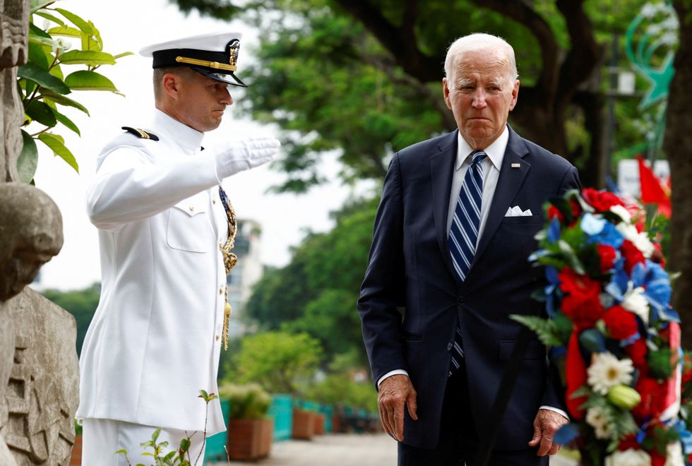 Joe Biden visits a memorial to late U.S. Senator John McCain in Hanoi, Vietnam