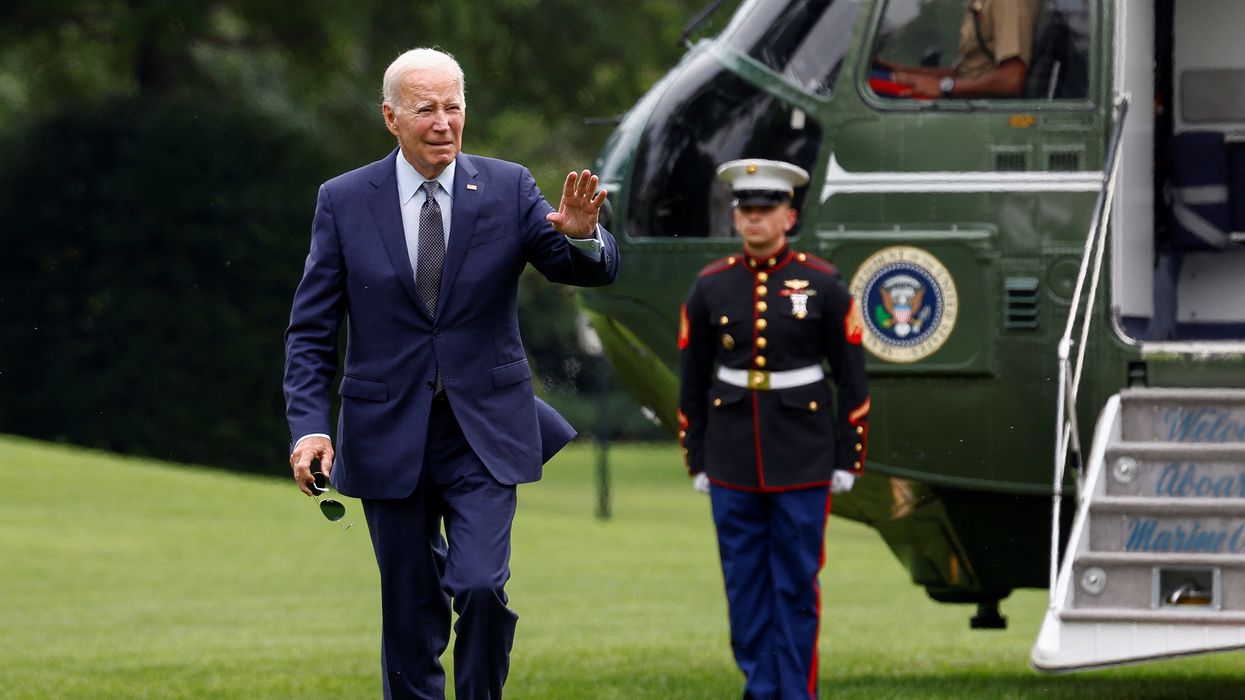 Joe Biden walks to the White House from Marine One on the South Lawn of the White House in Washington