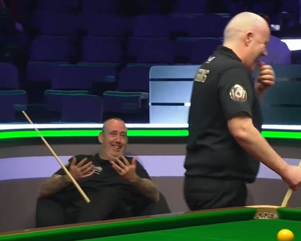 John Higgins and Mark Williams were able to laugh about the situation
