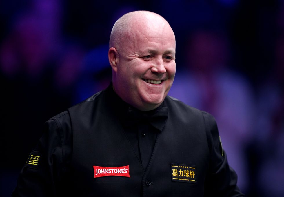 John Higgins defied the odds to beat world champion Zhao Xintong