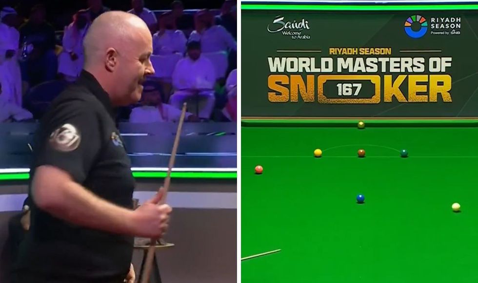 John Higgins had his chance at a maximum disrupted by fans