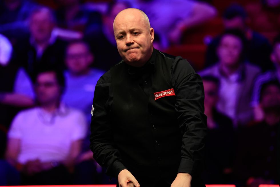 John Higgins has threatened to retire this year