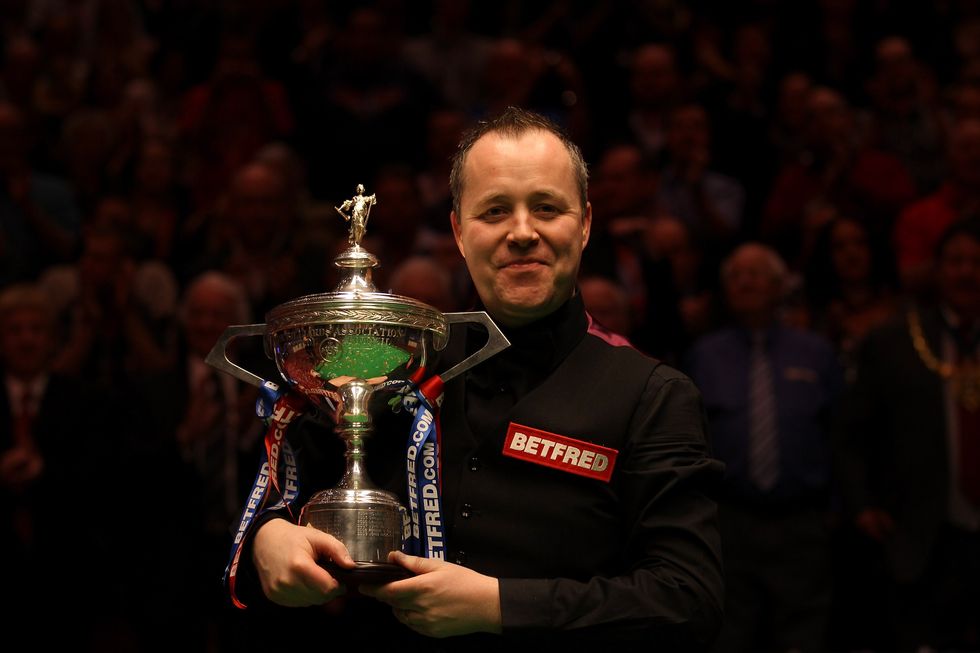 John Higgins has won four world titles