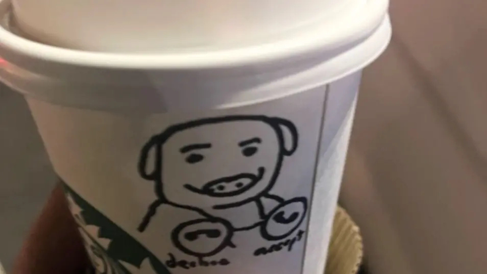 John Pork drawn on a Starbucks cup