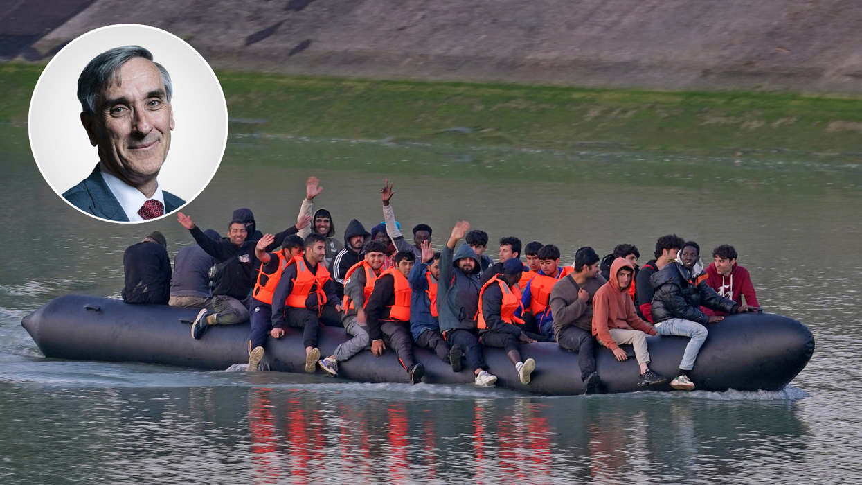 John Redwood and boat of migrants