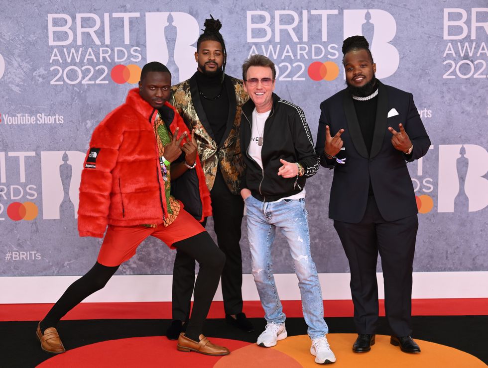 John Reid (second from right)