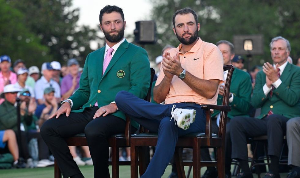 Jon Rahm handed the green jacket to Scottie Scheffler