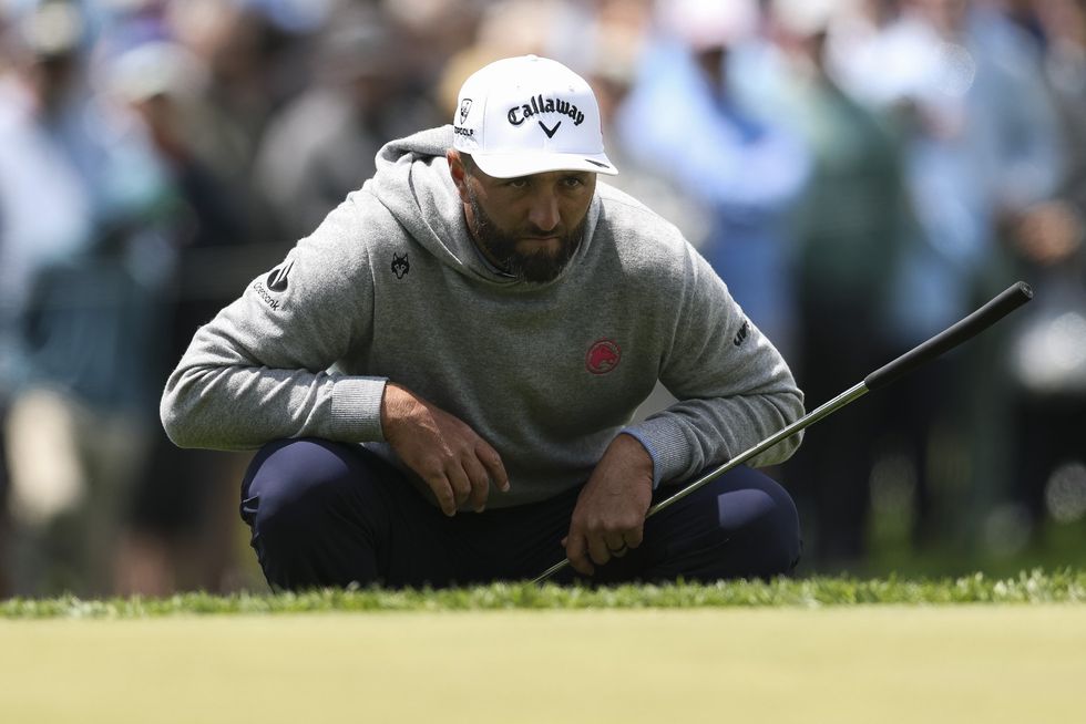 Jon Rahm has vowed to track down a volunteer and buy him a gift after a moment of frustration at the PGA Championship saw the former world No 1 accidentally strike the man in the face with a divot