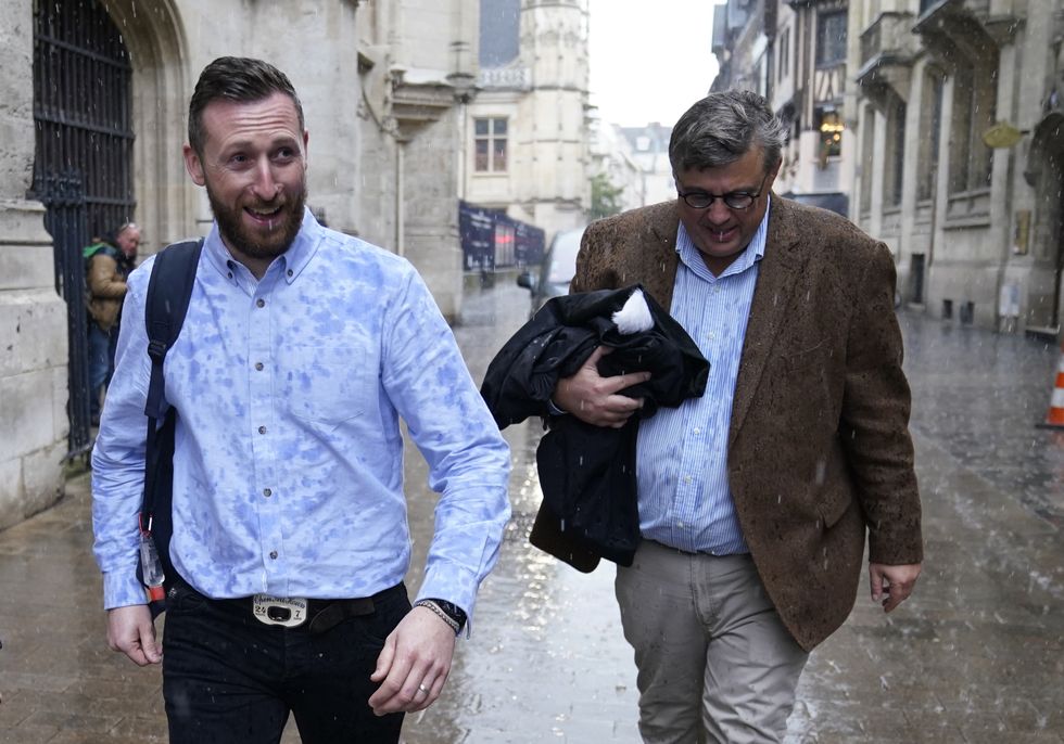 Jondy Ward, (left), the skipper of a Scottish-registered scallop dredger, the Cornelis Gert Jan, which is being held in Le Havre, leaves the Court Of Appeal Of Rouen, following a dispute between the UK and France over the number of licences issued to French fishing vessels by the UK.