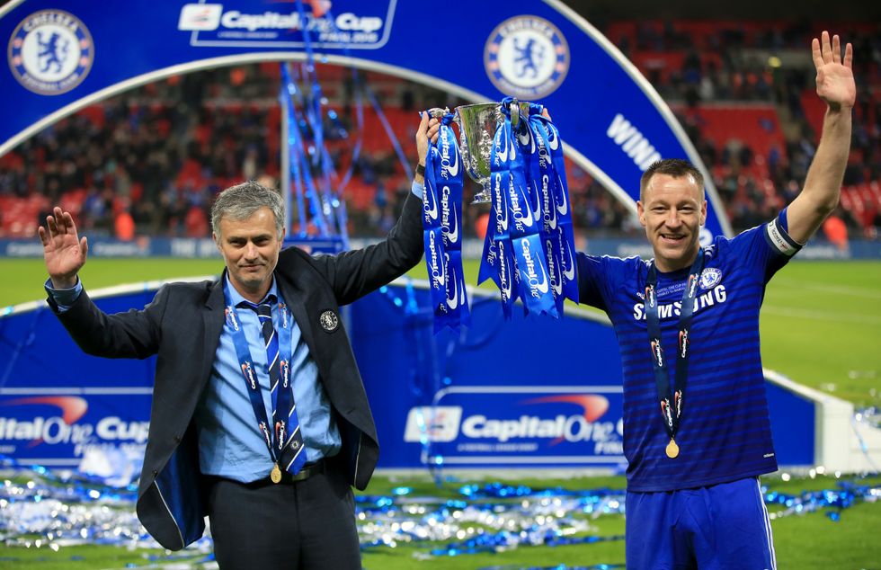 Jose Mourinho and John Terry celebrate winning the Capital One Cup final in 2015 with the trophy at Wembley.