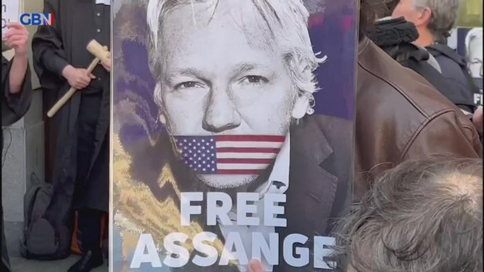 Jeremy Corbyn joins protesters outside court ahead of Julian Assange extradition probe