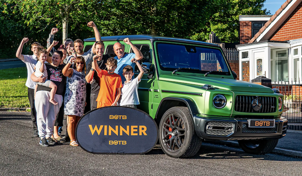 Julian Boote with his family celebrating his BOTB win of the Mercedes AMG G-63