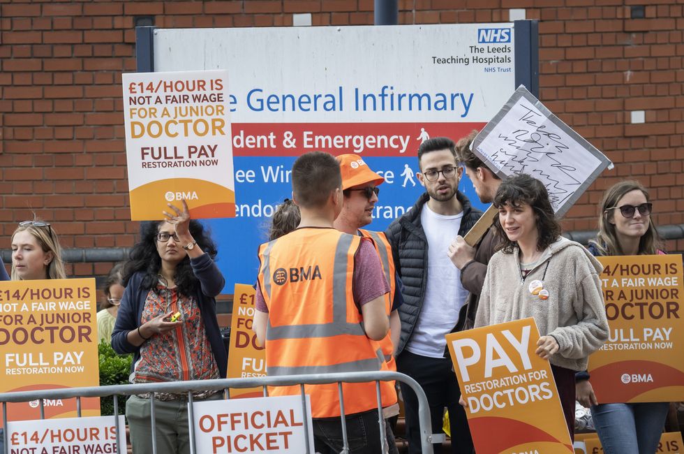 Junior doctor and members of the British Medical Association (BMA) on the picket line outside Leeds General Infirmary