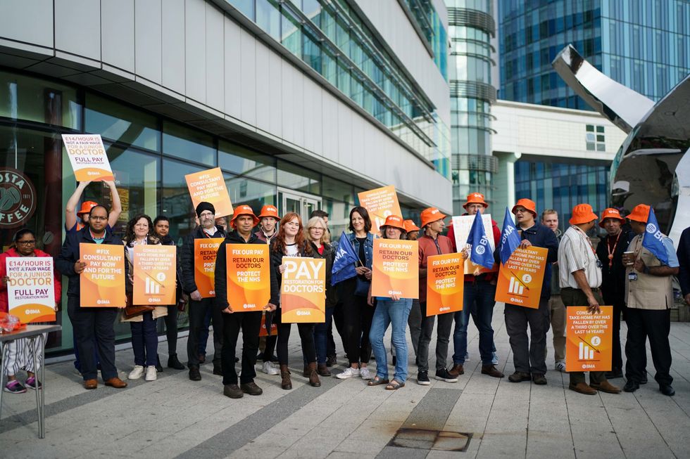 Junior doctors and medical consultant members of the British Medical Association (BMA) on the picket line