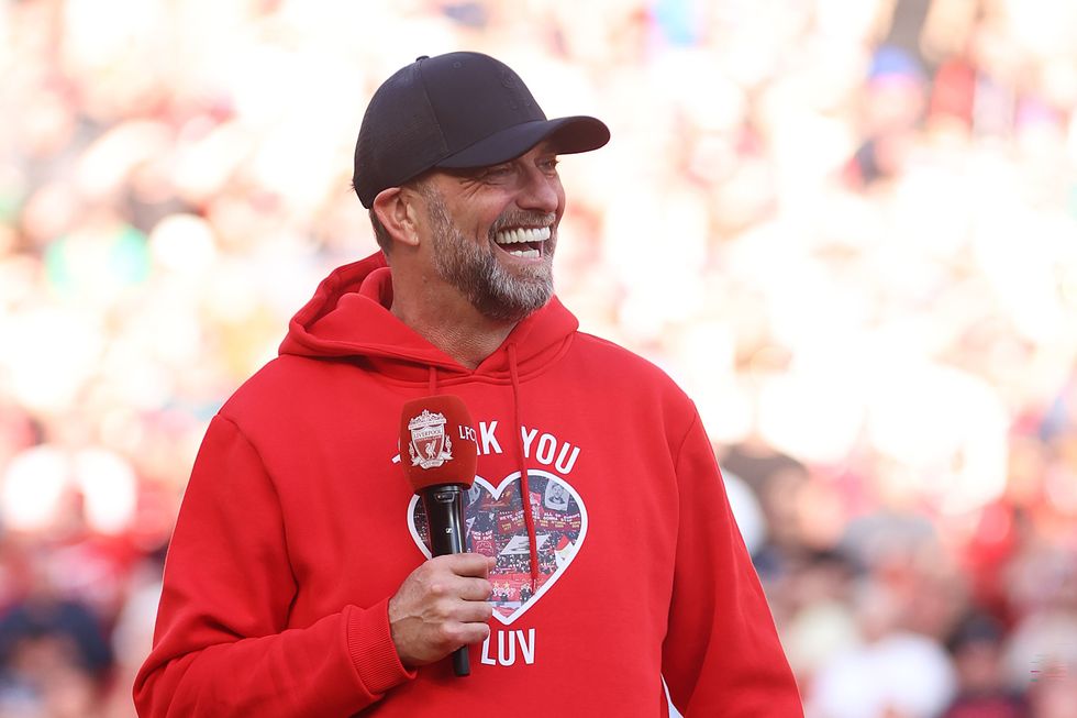 Jurgen Klopp beamed from ear-to-ear as he delivered a speech