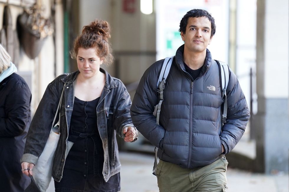 Just Stop Oil protesters, Emily Brocklebank, 23 and Xavier Gonzales-Trimmer, 21, leave Westminster Magistrates' Court in London. Brocklebank was charged with criminal damage to the frame of Vincent Van Gogh's 1888 work Sunflowers at the National Gallery in London after throwing soup over it during a protest. Gonzales-Trimmer, originally faced the same charges after being accused of %22distracting the guards%22 but they were dropped. However, he was fined for failing to appear at the court for a first hearing. Picture date: Tuesday November 22, 2022.