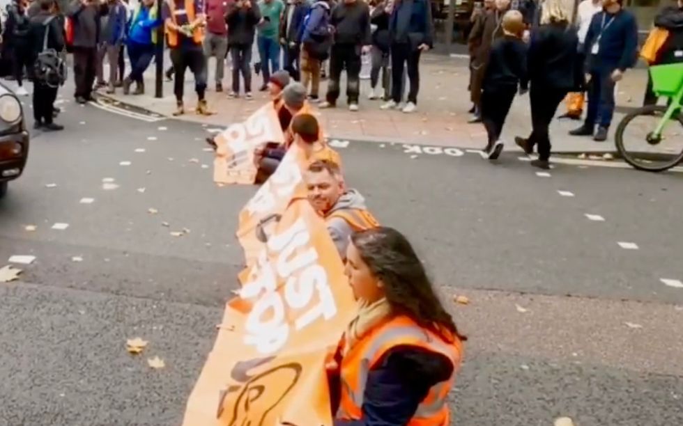 Just Stop Oil protesters stopped traffic at a key junction near Holborn station in London on Friday morning