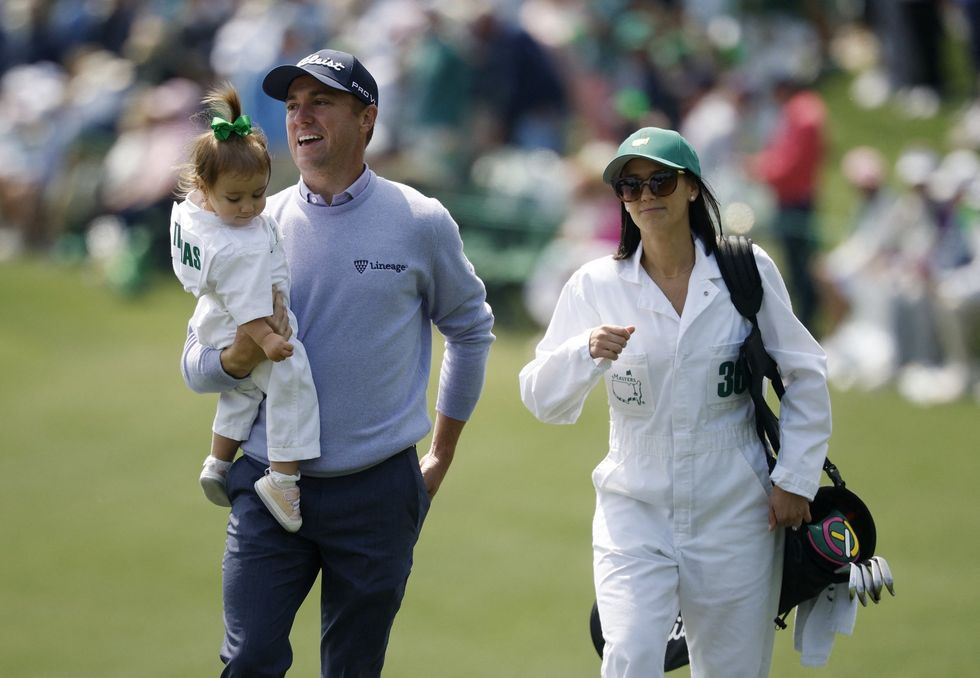 Justin Thomas celebrated with his wife and daughter on the course
