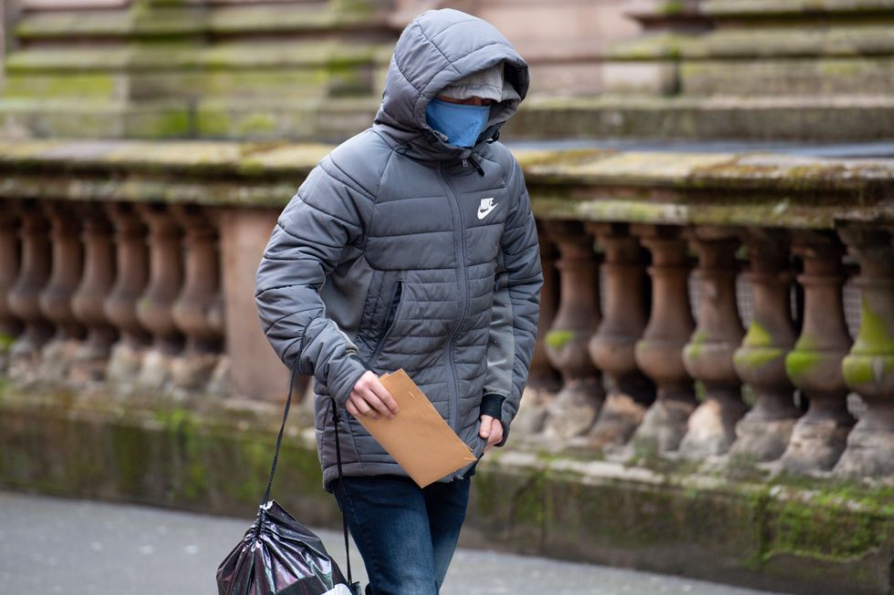 Kallum Aish, then 18, arrives at Birmingham Crown Court, where he is appearing after pleading guilty to six driving offences in relation to a car crash in which a dog was killed and its owner injured