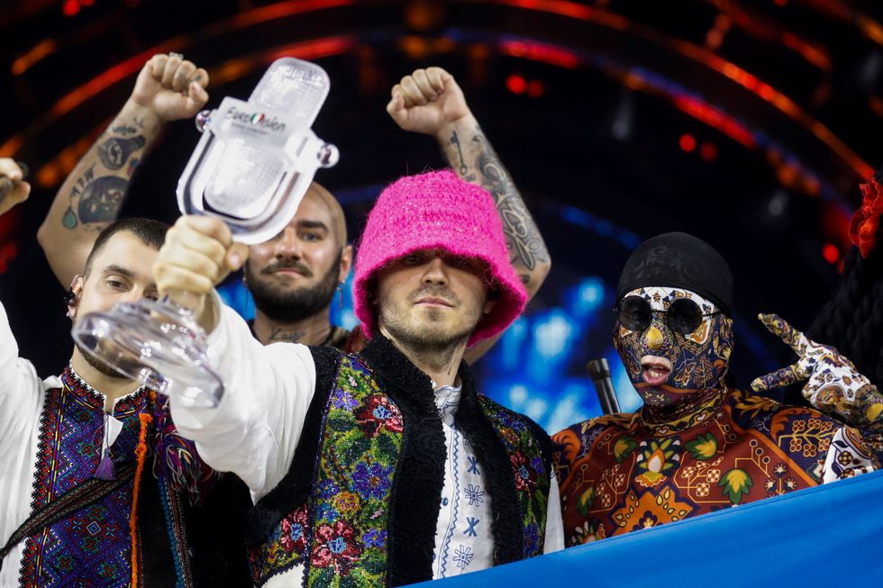 Kalush Orchestra from Ukraine pose after winning the 2022 Eurovision Song Contest in Turin, Italy, May 15, 2022. REUTERS/Yara Nardi