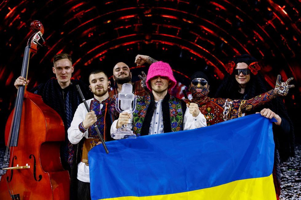 Kalush Orchestra from Ukraine pose after winning the 2022 Eurovision Song Contest in Turin, Italy