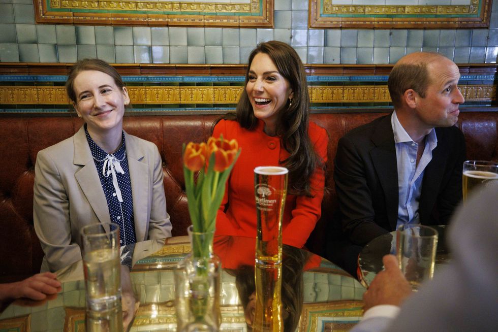 Kate and William sat in a pub