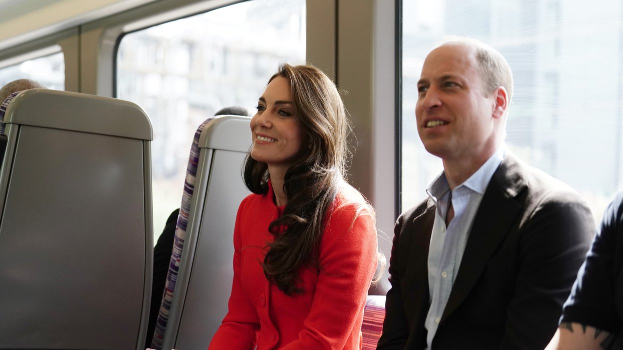 Kate and William sat on an Elizabeth Line train