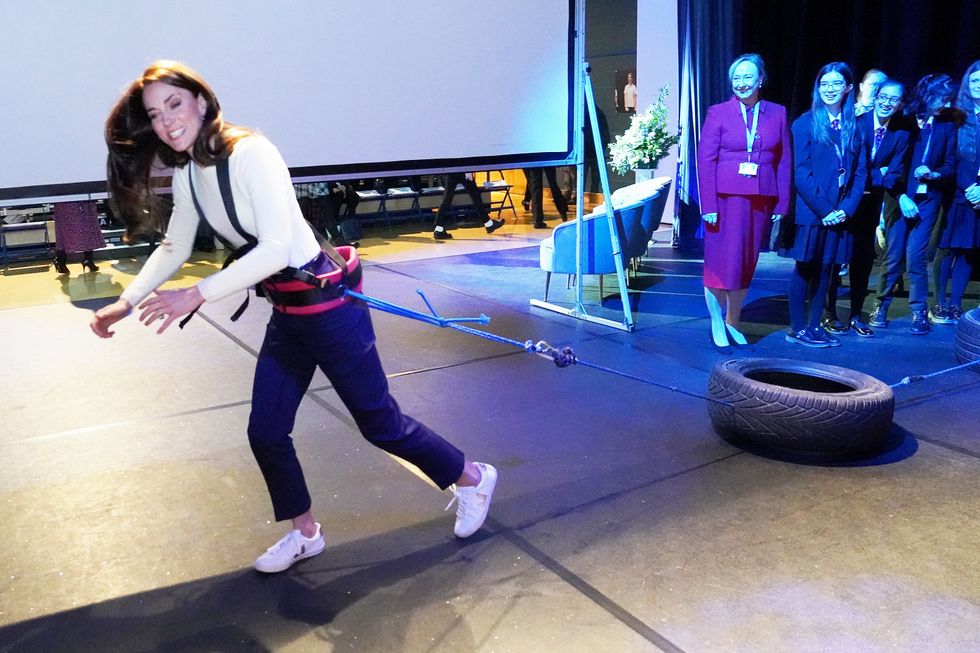 Kate clenched her teeth as she dragged the tyre