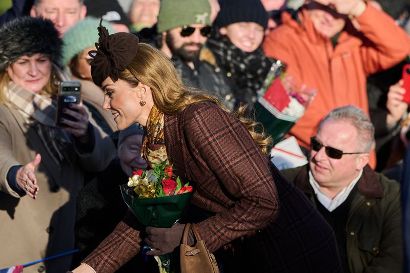 Kate Middleton jokes royal fan ate ‘too many mince pies’ after his chair  tumbles