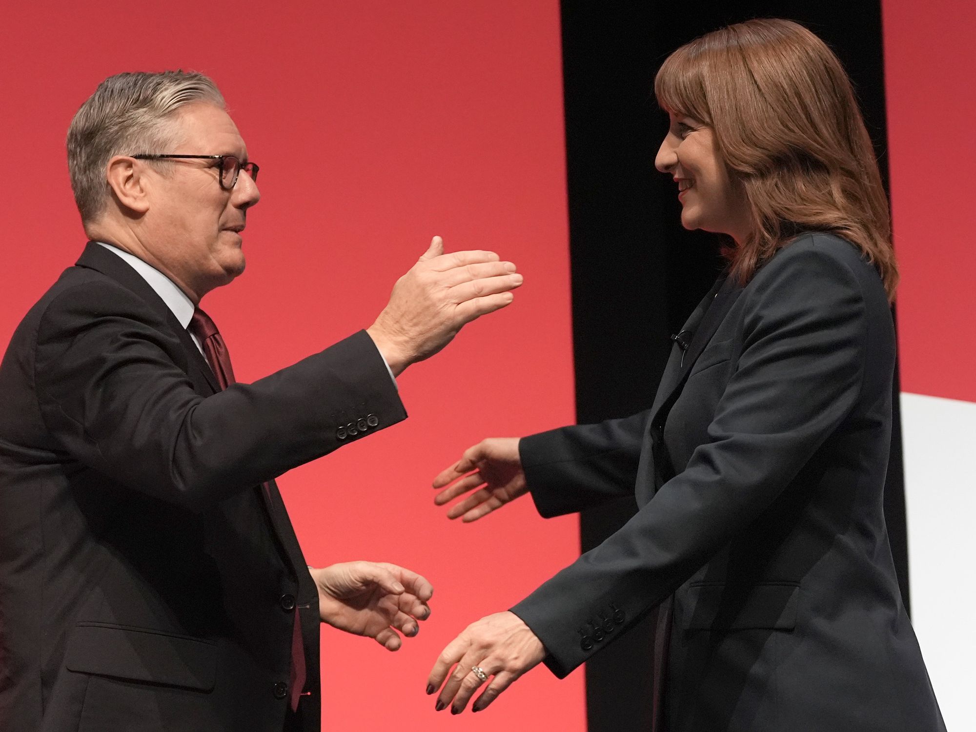 Keir Starmer and Rachel Reeves going in for a hug