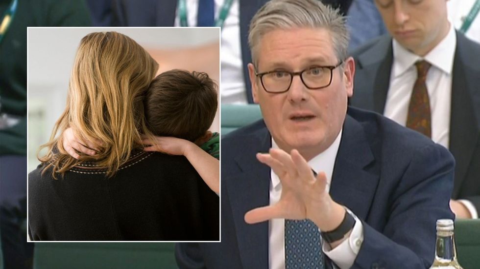 Keir Starmer and woman with child