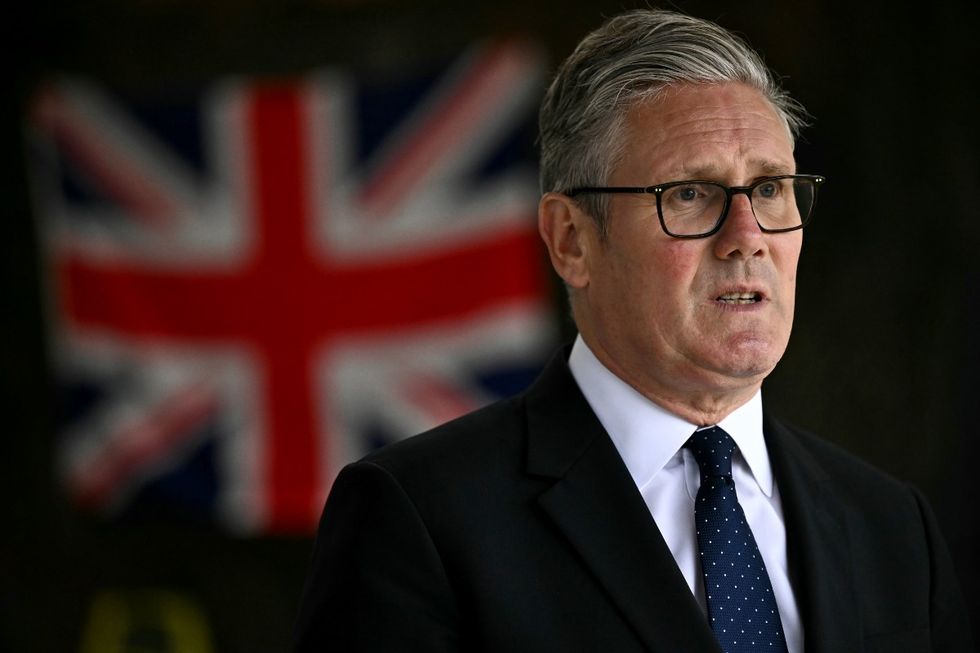 Keir Starmer in front of a Union Jack