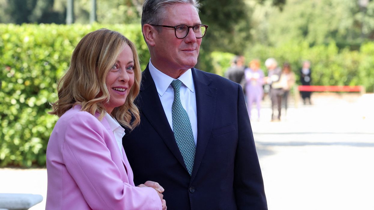 Keir Starmer shakes hands with Italian Prime Minister Giorgia Meloni