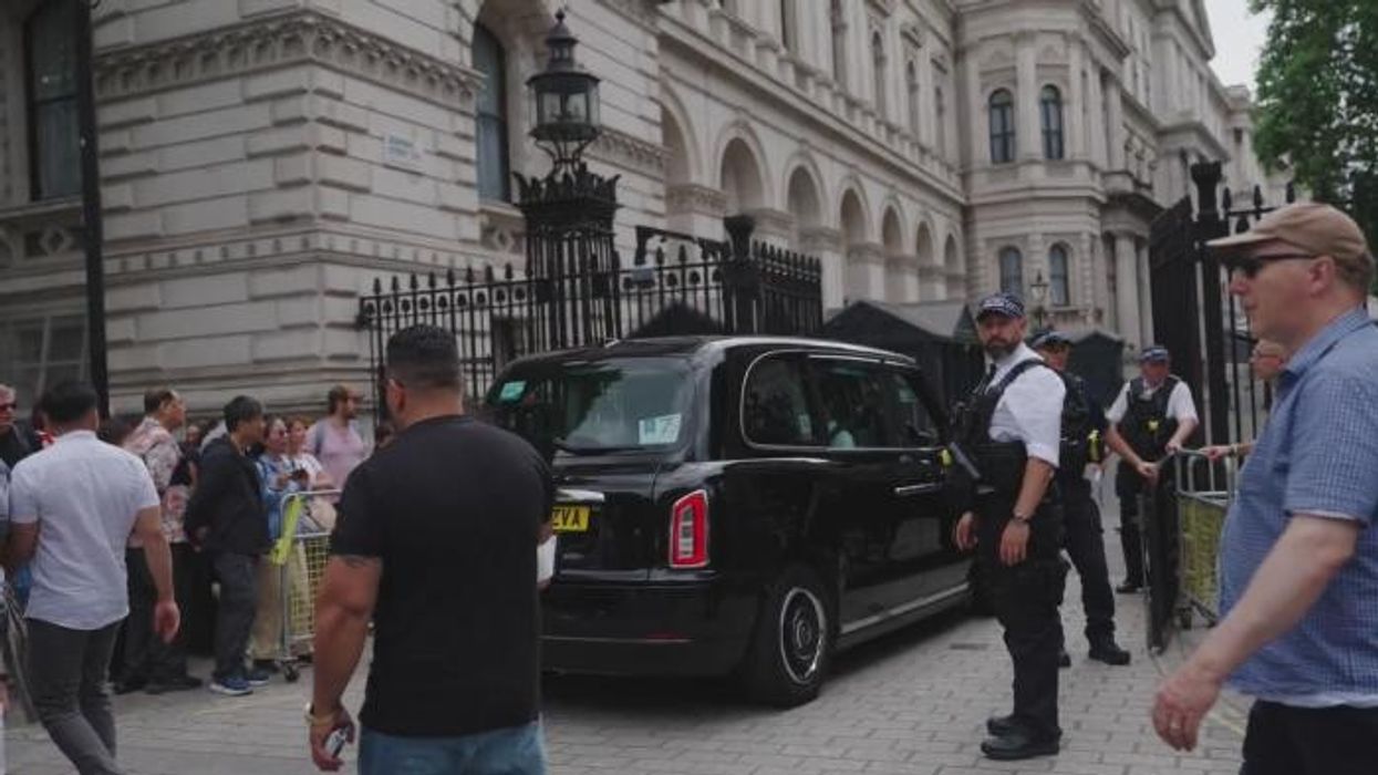 'Brought it home!' Keir Starmer sits down with veterans and cab drivers for D-Day - WATCH