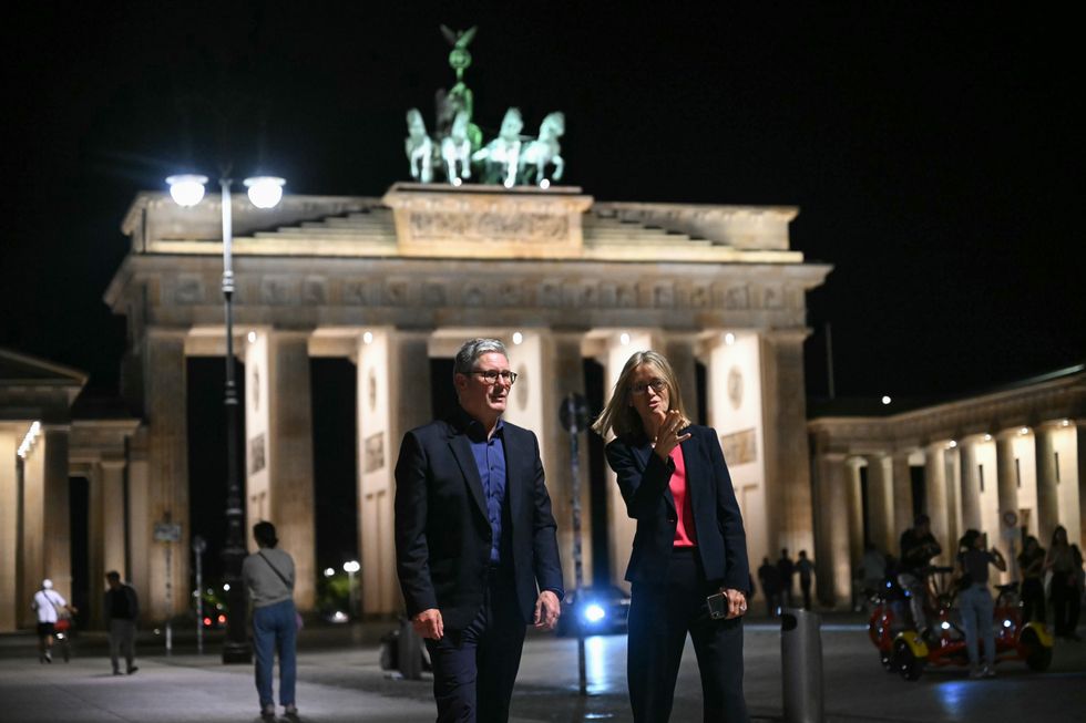 Keir Starmer, with British Ambassador to Germany Jill Gallard, by the Brandenburg Gate in Berlin