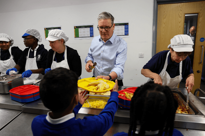 Keir Starmer working a school canteen
