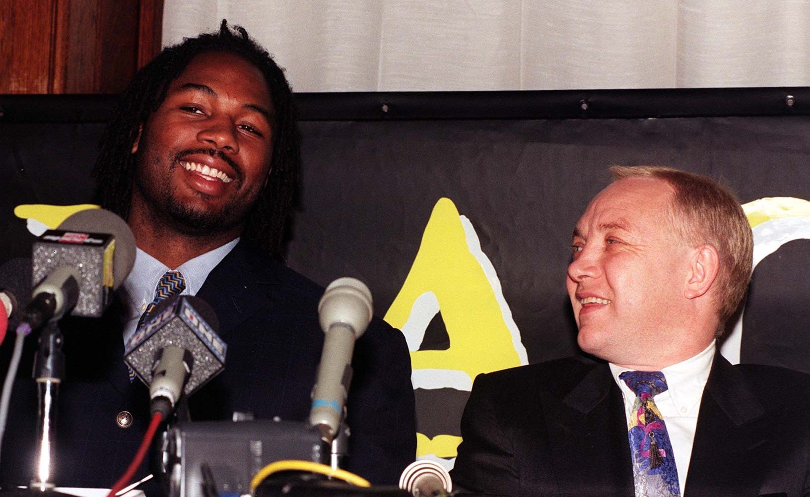 Kellie Maloney, born Frank Maloney, pictured with Lennox Lewis in 1996, who she managed between 1989 and 2001