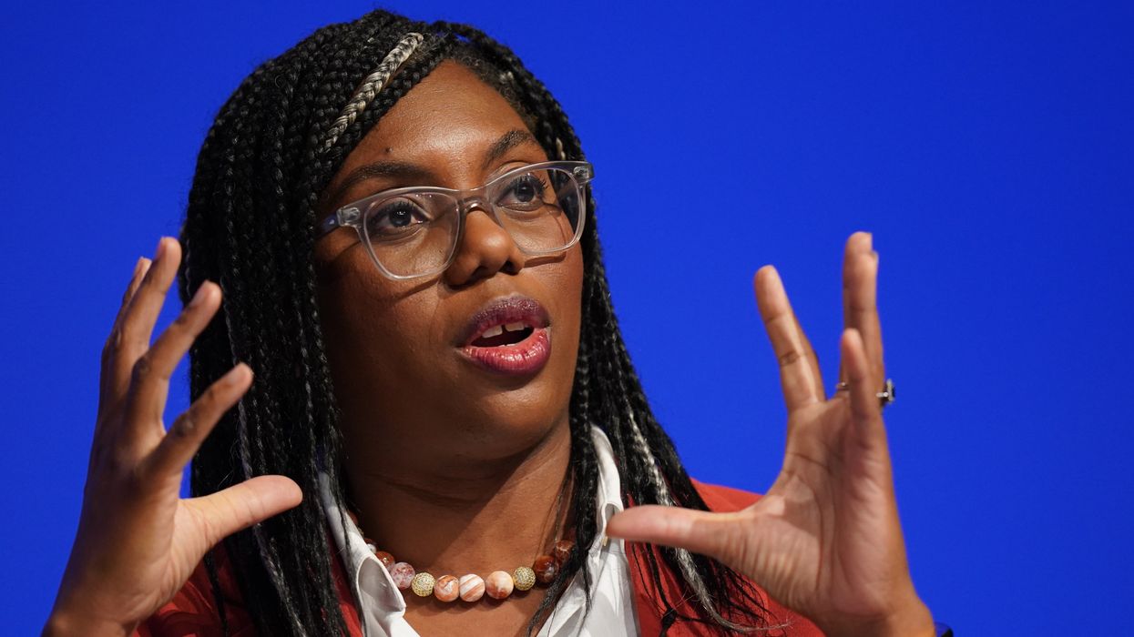 Kemi Badenoch speaking on stage during the Conservative Party annual conference at the International Convention Centre in Birmingham