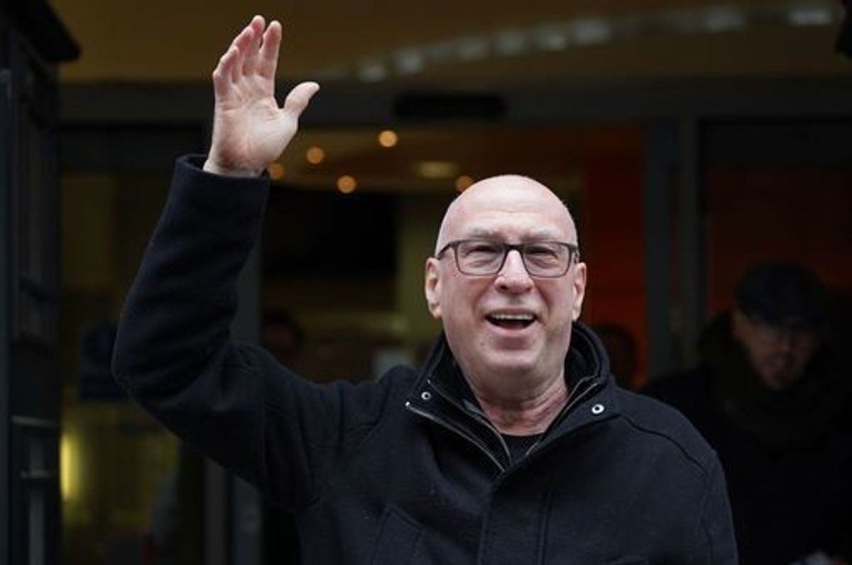 Ken Bruce waving as he leaves the BBC