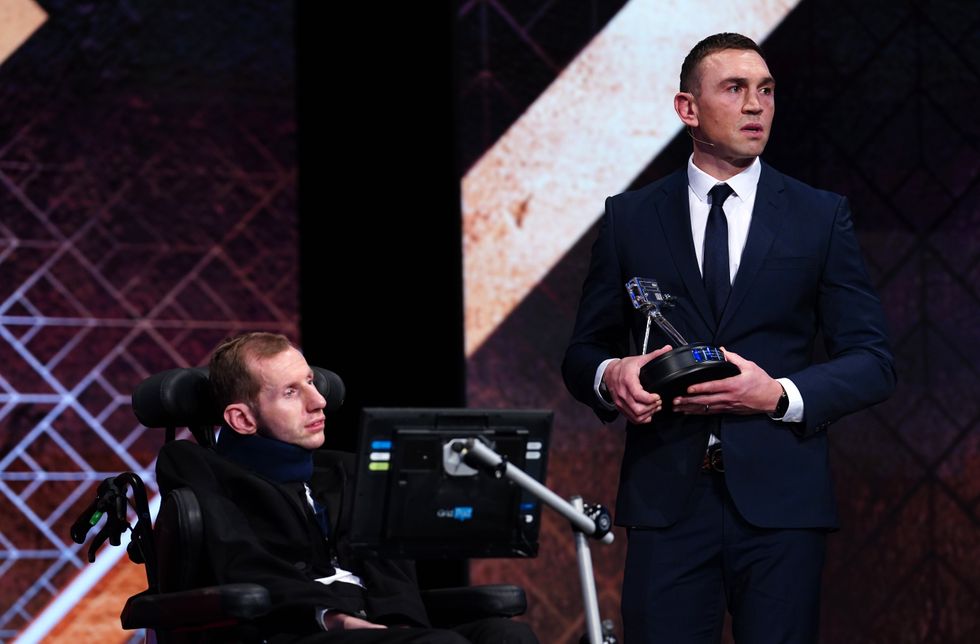 Kevin Sinfield holds his BBC Special Award alongside Rob Burrow during the BBC Sports Personality of the Year Awards 2022