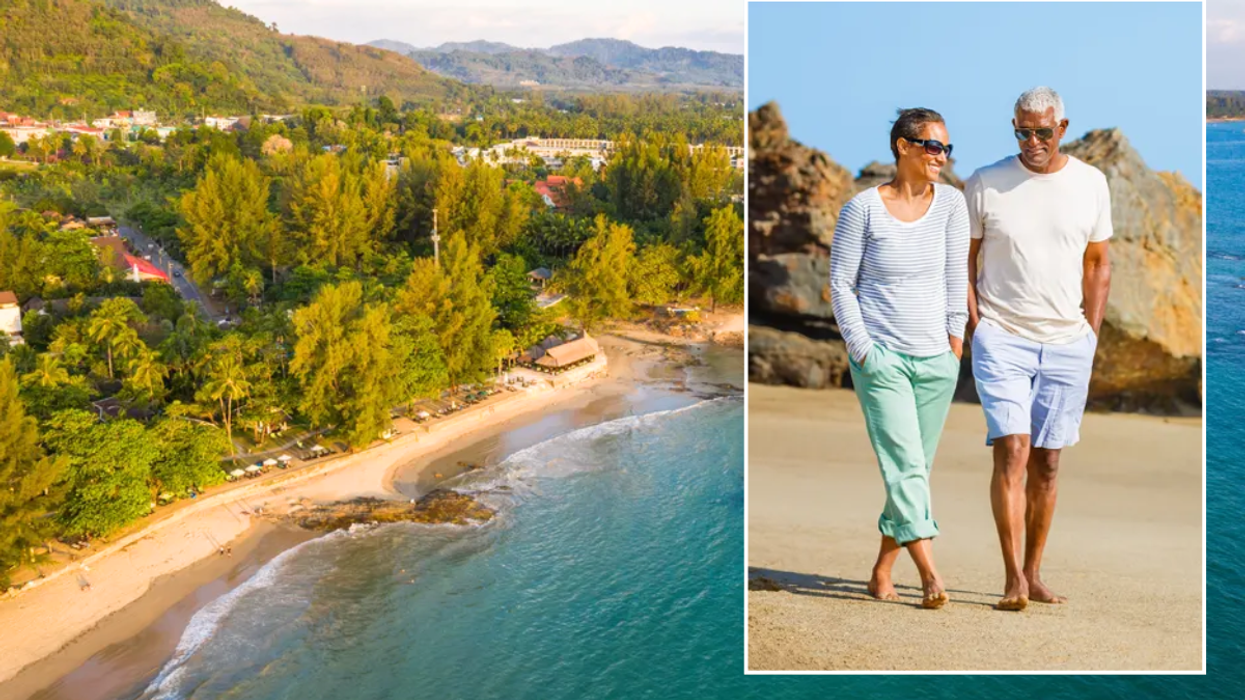Khao Lak beach Thailand / middle aged couple walking on beach