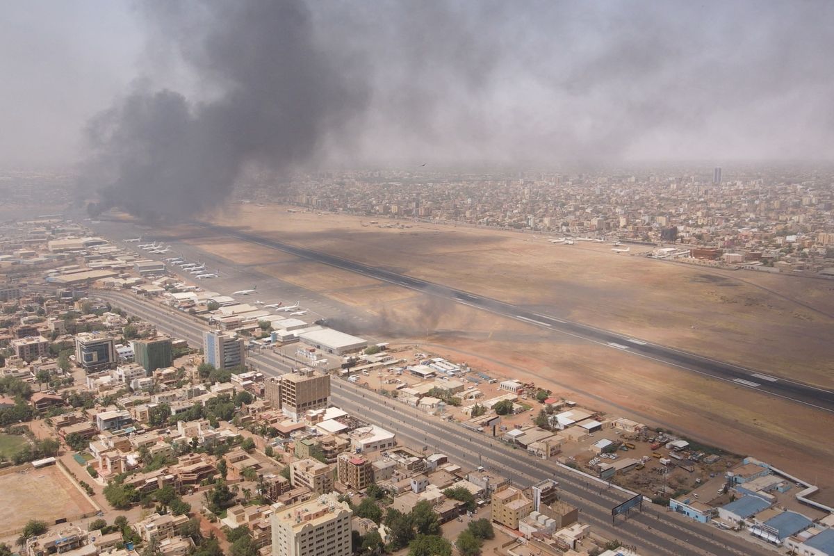 Khartoum airport with smoke rising