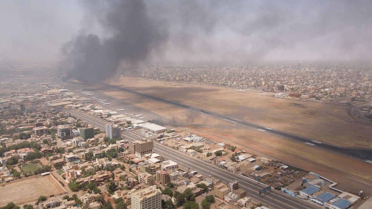 Khartoum airport with smoke rising