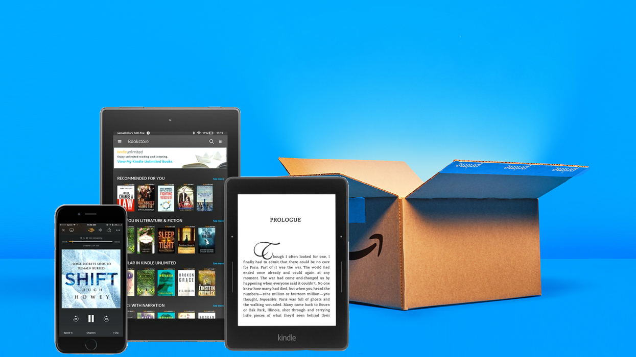 kindle unlimited service shown on an iphone kindle and tablet with a prime day shipping box in the background