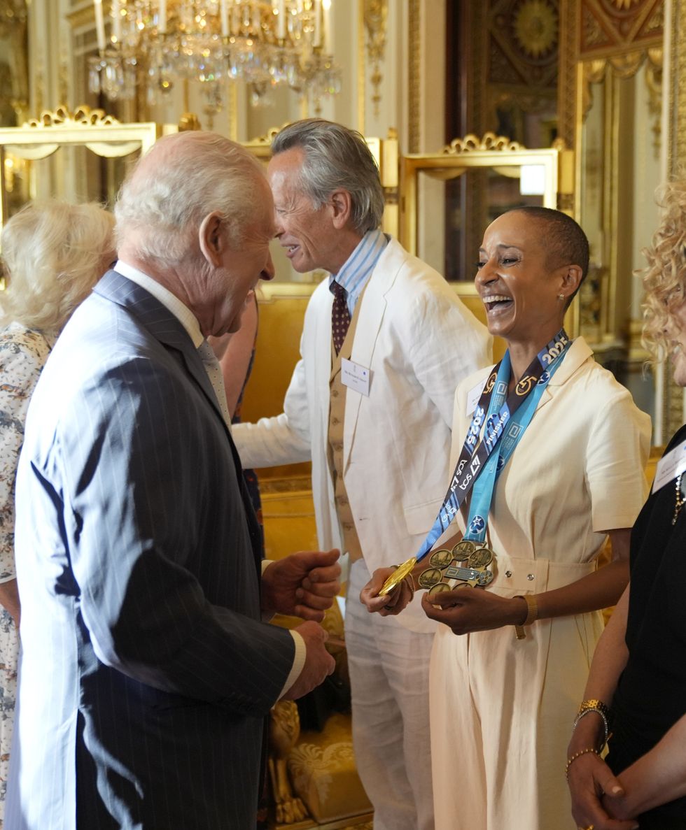 King Charles and Adele Roberts